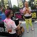 Aaron Dick, 19, of Temperance, proposes to his girlfriend Alexis Miller, 20, of Temperance, after the Ypsilanti Color Run 5K on Sunday morning. She said yes. Melanie Maxwell I AnnArbor.com